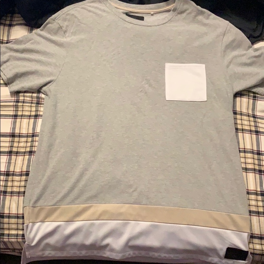 On the Byas grey pocket T